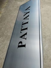 ป้ายสแตนเลสกัดกรดลงสี