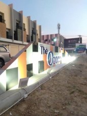 อักษรโลหะยกขอบทำสีติดบนคอมโพสิท ไฟออกหลัง+ติดสปอร์ทไลท์