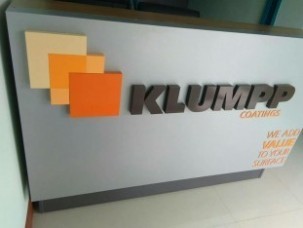 อักษรโลหะยกขอบทำสีติดบนคอมโพสิท